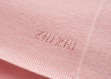 Seamless Wool V-Neck Tee in Hibiscus Pink - detail knitted signature - Hibiscus Pink
