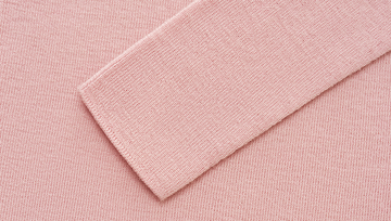 Seamless Wool V-Neck Tee in Hibiscus Pink - detail sleeve finish - Hibiscus Pink