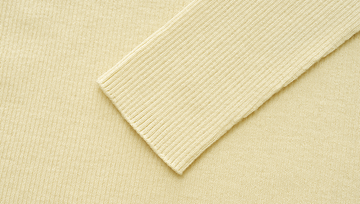 Seamless Wool Round-Neck Tee in Soft Yellow - detail sleeve finish - Soft Yellow