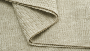 Ribbed Wool Polo Knit in Jade White - detail hem finish - Jade White