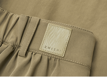 Twill A-Line Skirt in Rock Green Khaki - detail leather waist patch - Rock Green Khaki