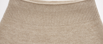 Muyuzi Flared Wool Midi Skirt in Light Apricot Beige - Ribbed waist detail