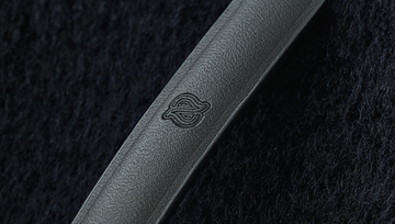 Baixingyueman Signature Slim Leather Belt in Ink Black - detail embossed leather tip - Ink Black